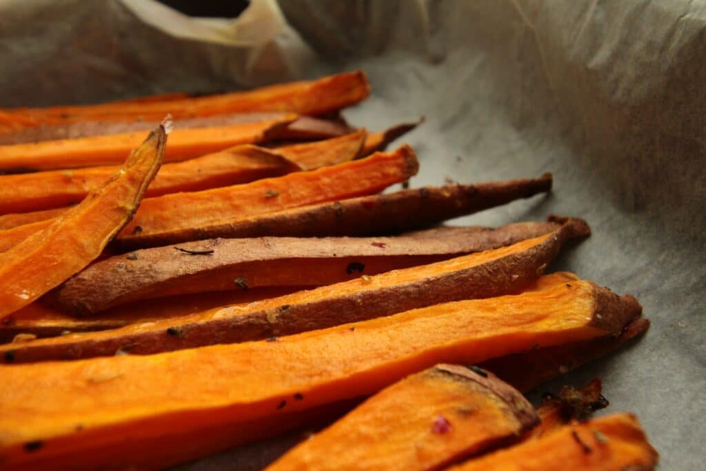 sliced carrots on stainless steel tray